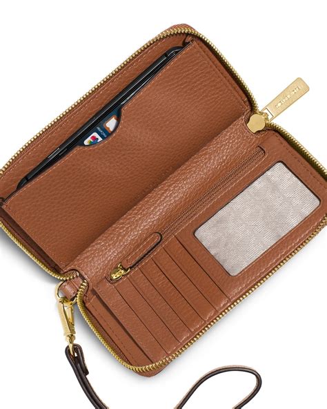 michael kors wallet cell phone|Michael Kors multifunction wallet.